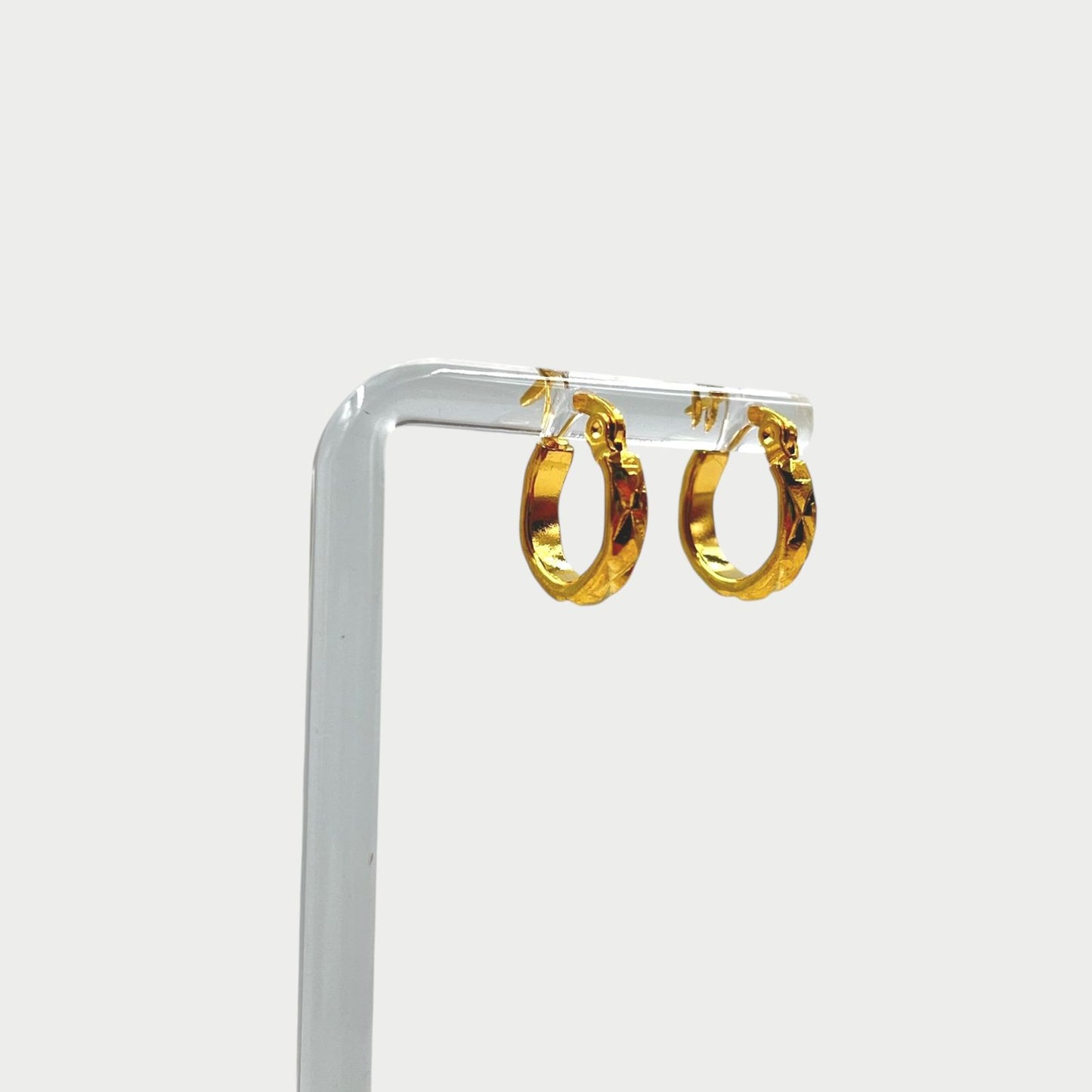 Aros de argolla acero dorado labrados