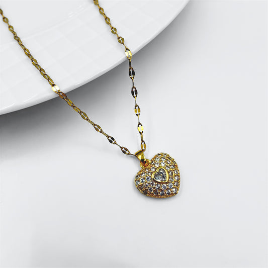 Cadena y dije en acero dorado corazon con strass