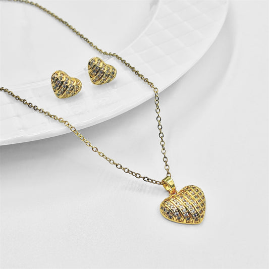 Cadena y dije con aros en acero dorado
