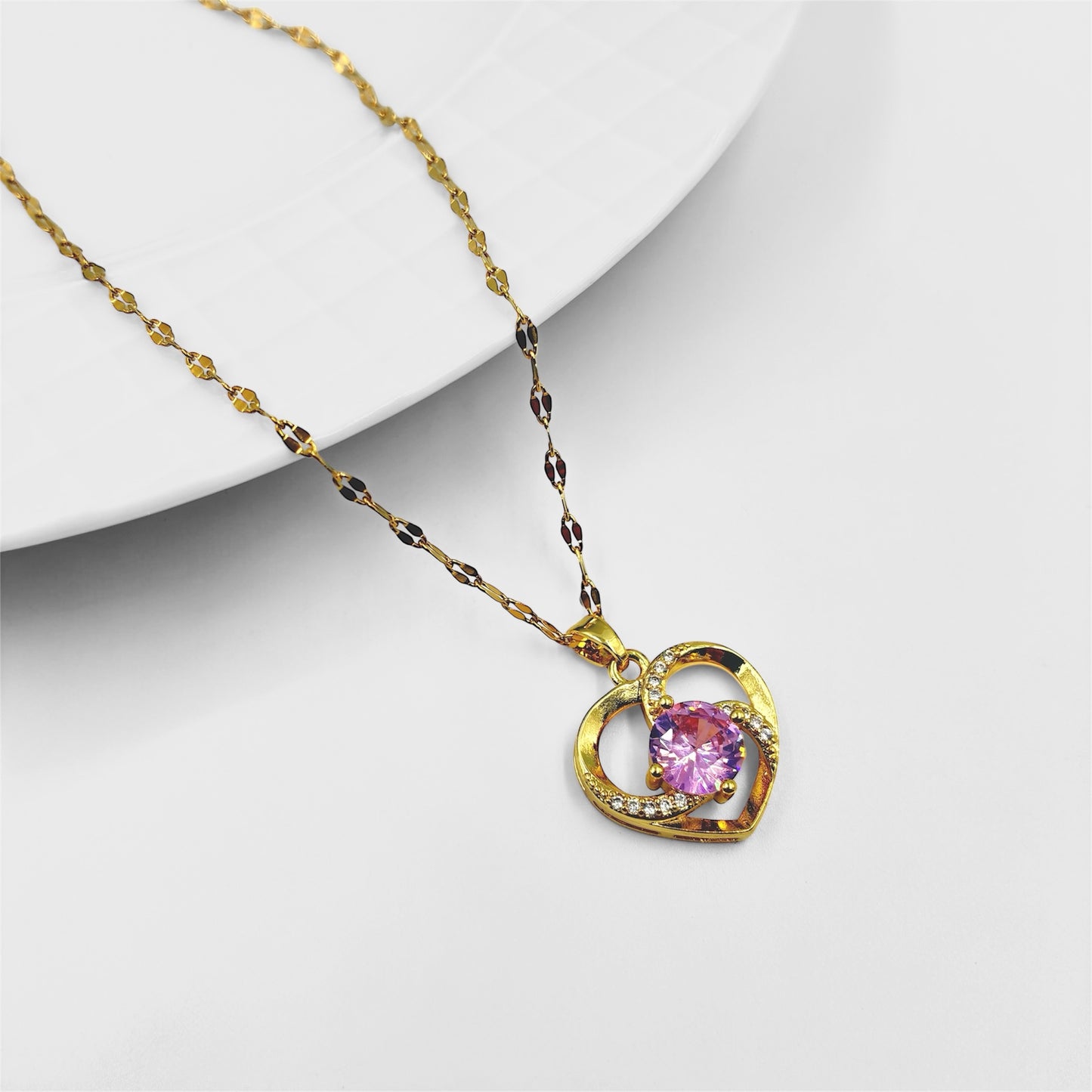 Cadena y dije acero dorado corazon con centro cubic rosa