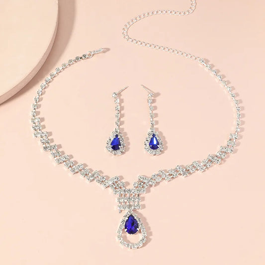 Conjunto de bijouterie plateado con strass y piedra azul