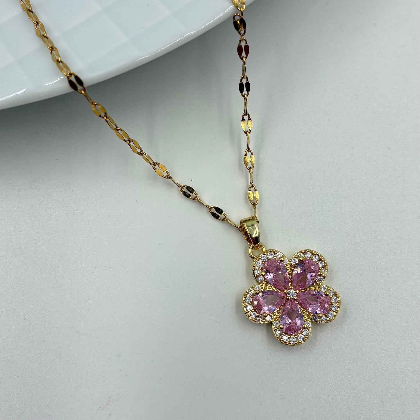 Conjunto flor rosado