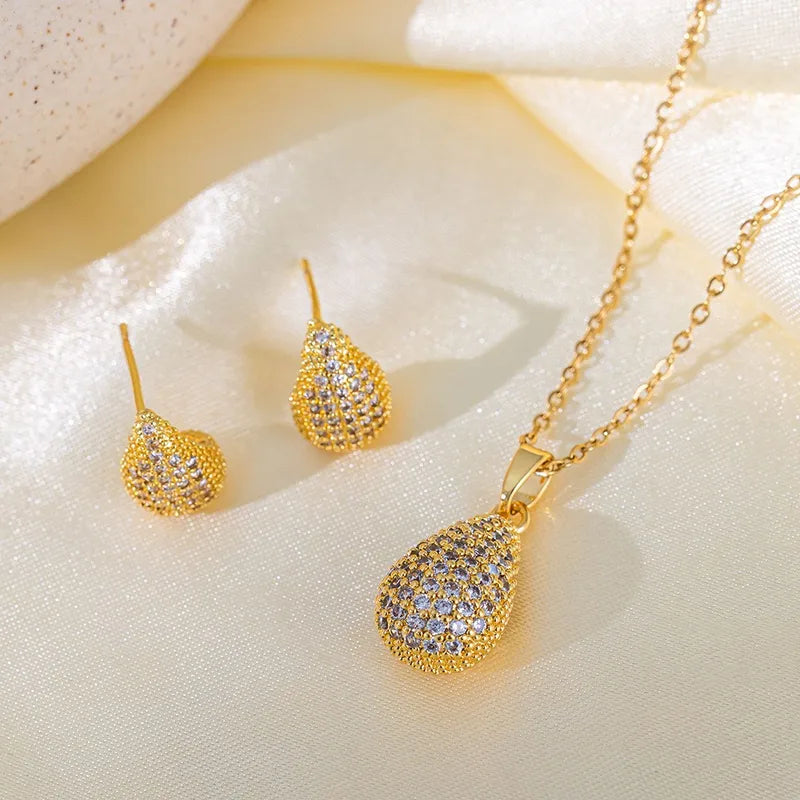 Cadena y dije con aros en acero dorado