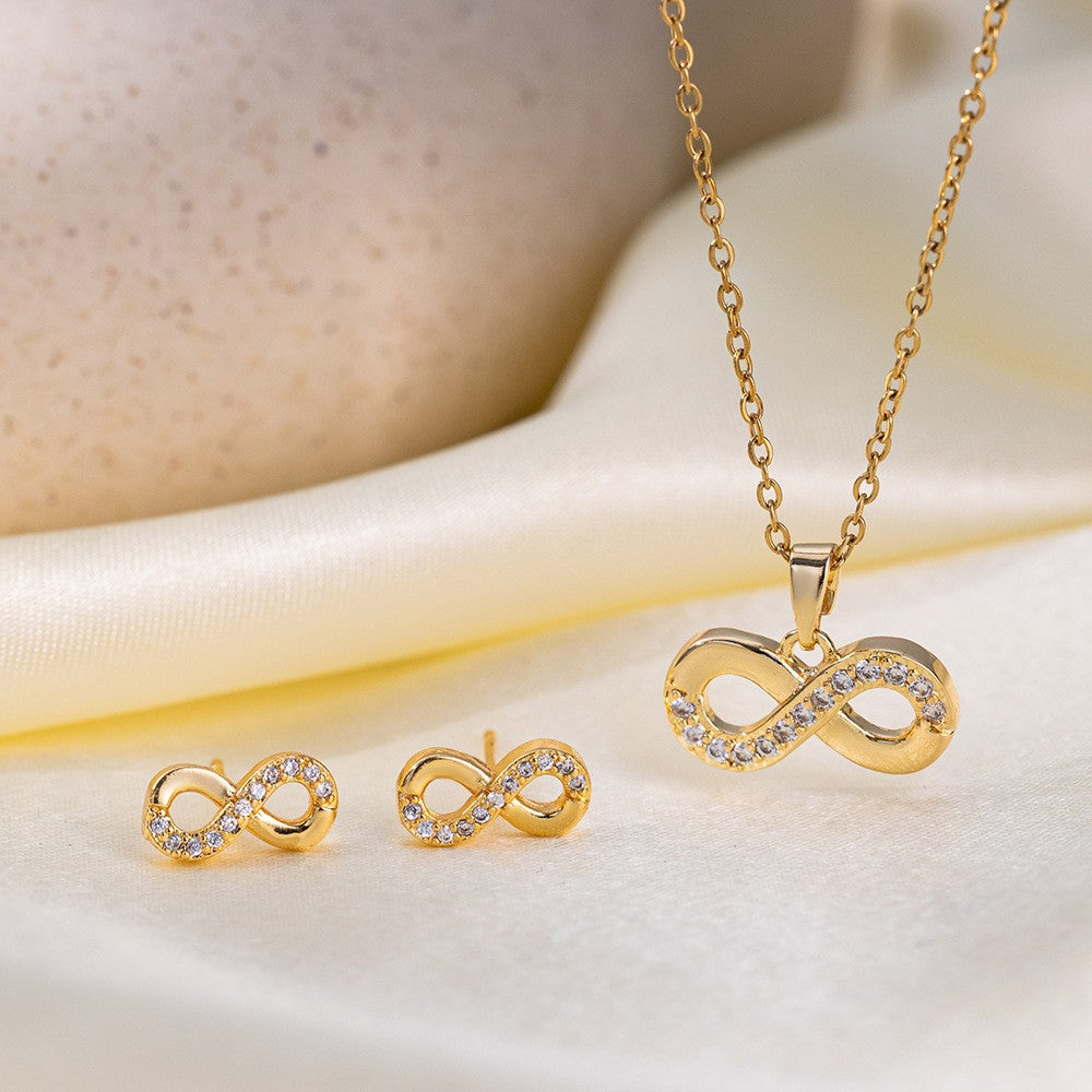 Cadena y dije con aros en acero dorado