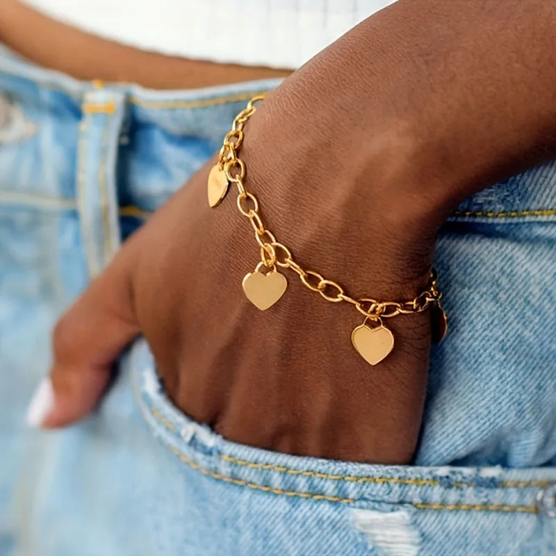 Pulsera de acero dorado con 4 corazones