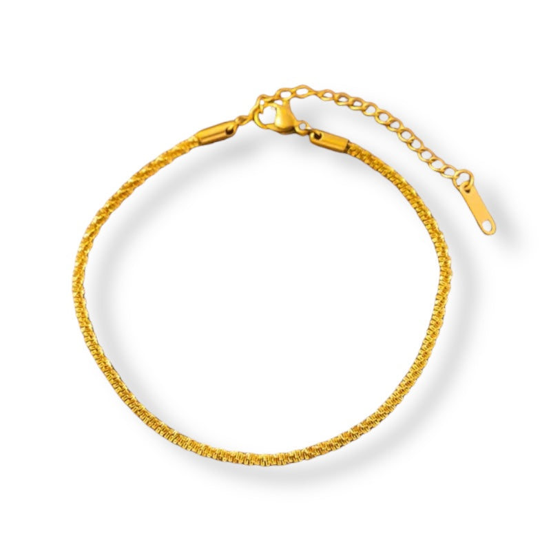 Pulsera acero dorado facetada