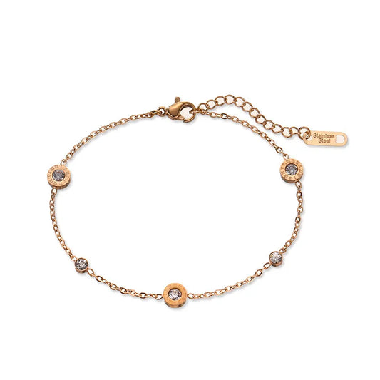 Pulsera de acero dorado con strass