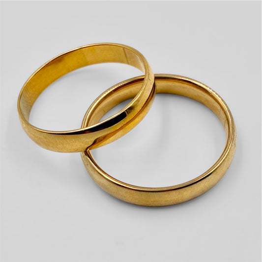 Par de alianzas en acero dorado 4mm