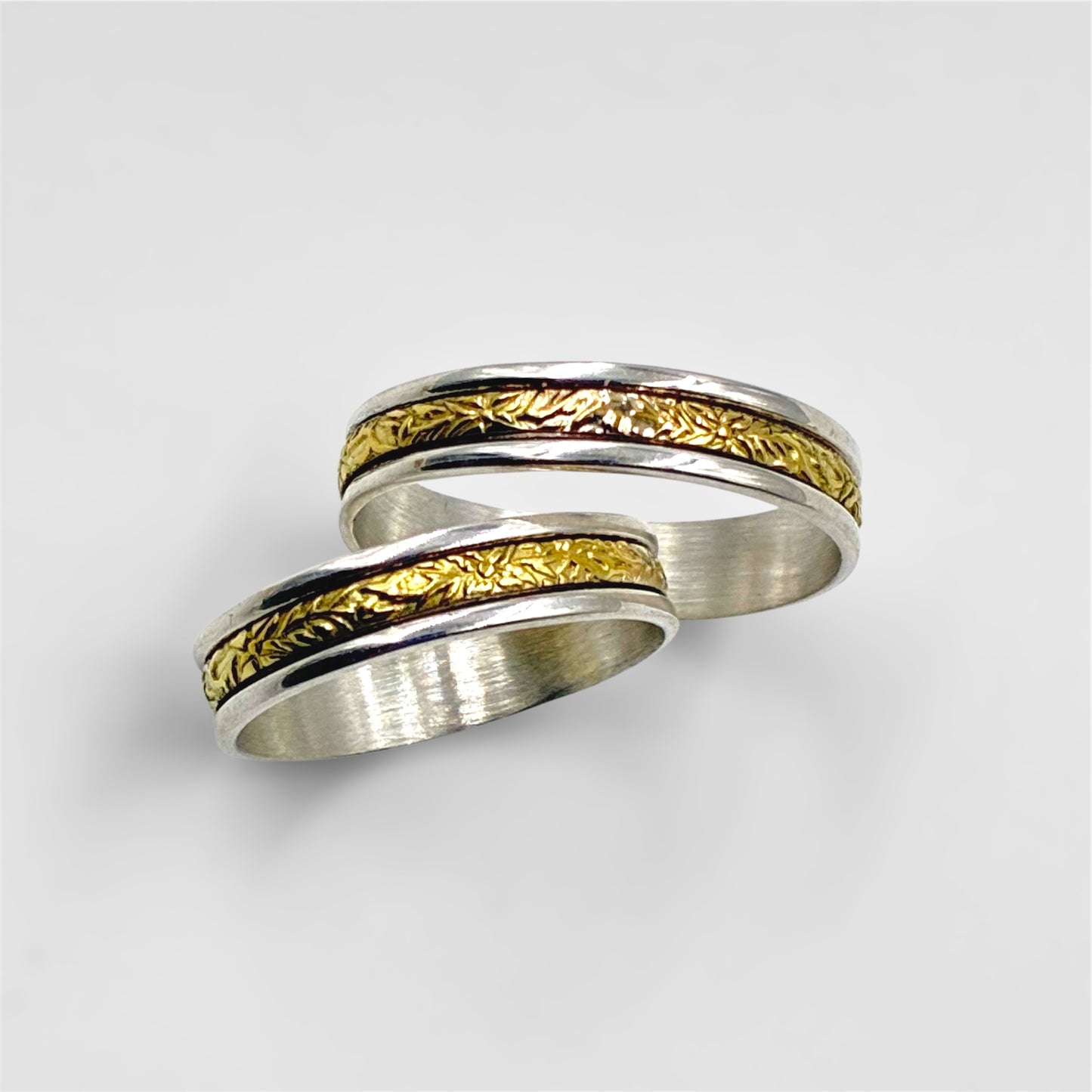 Par de alianzas de Plata y duble de oro