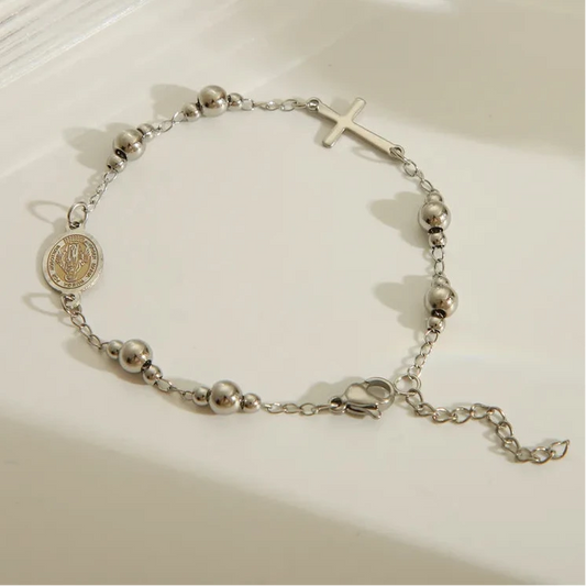 pulsera de acero plateado con cruz y centro medalla milagrosa