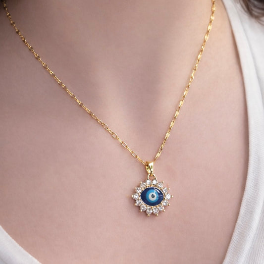 Cadena y dije ojo turco en acero dorado