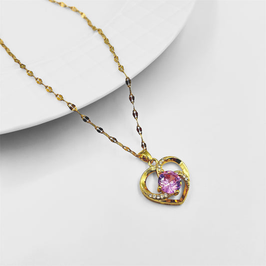 Cadena y dije acero dorado corazon con centro cubic