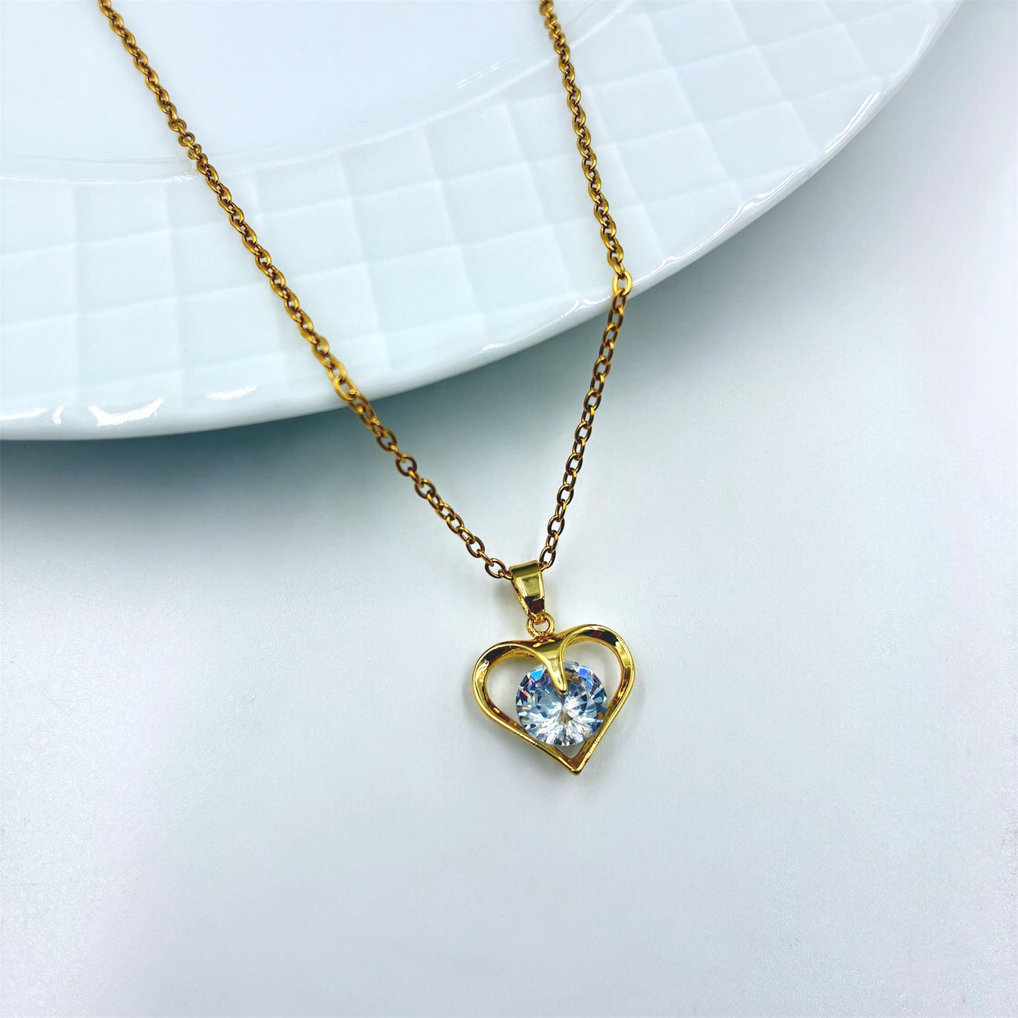 Cadena y dije corazon acero dorado