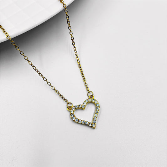 Cadena y dije corazon con strass en acero dorado
