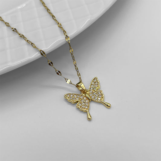 Cadena y dije Mariposa en acero dorado