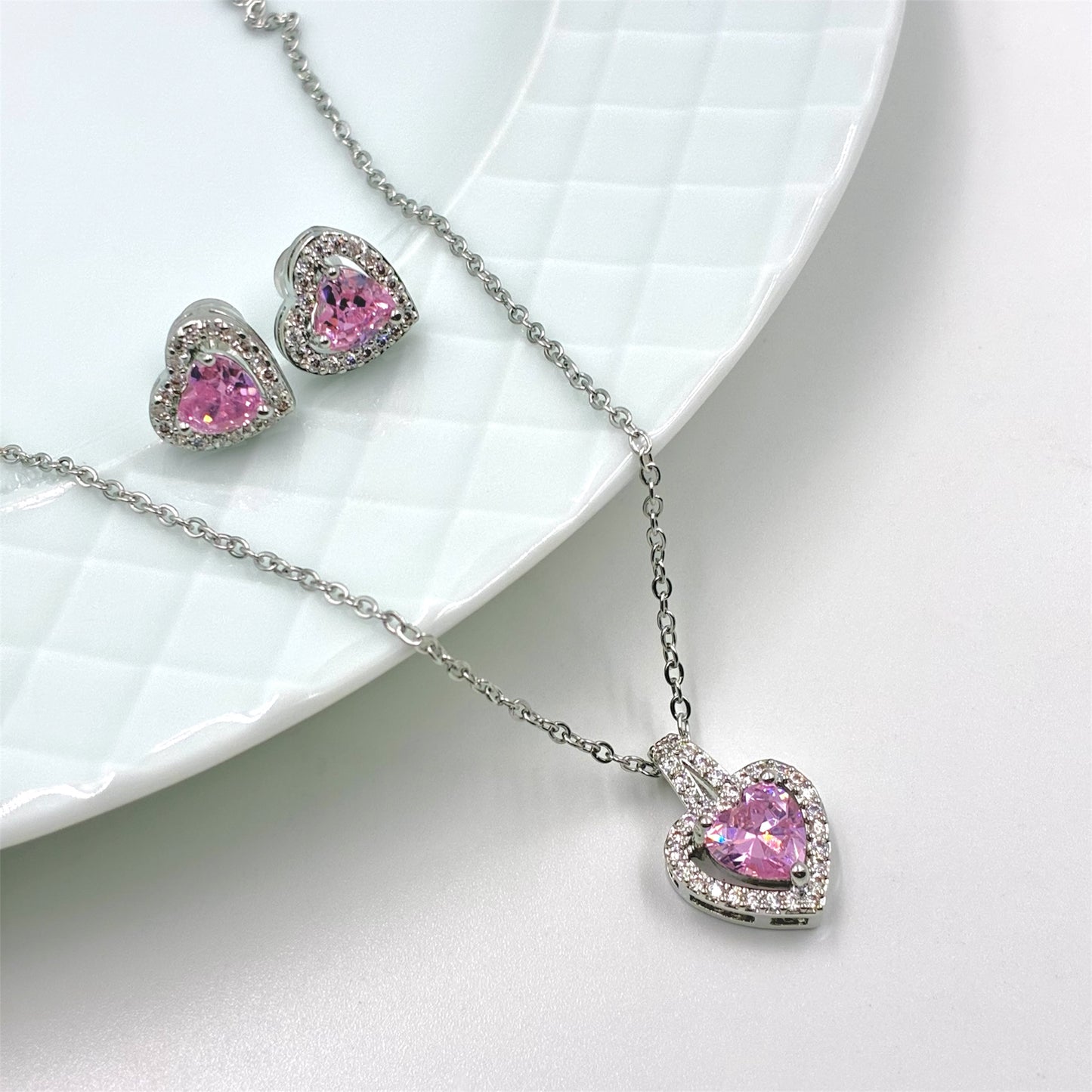 Conjunto corazon con aros en acero