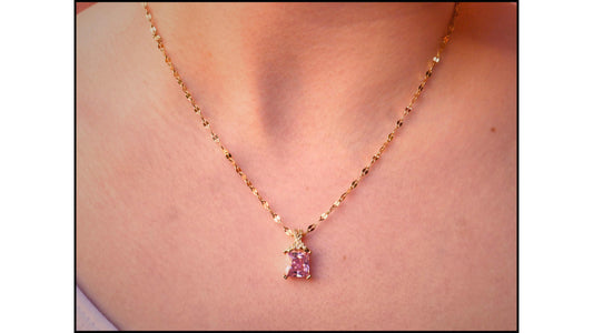 Cadena con dije cubic rosa en acero dorado