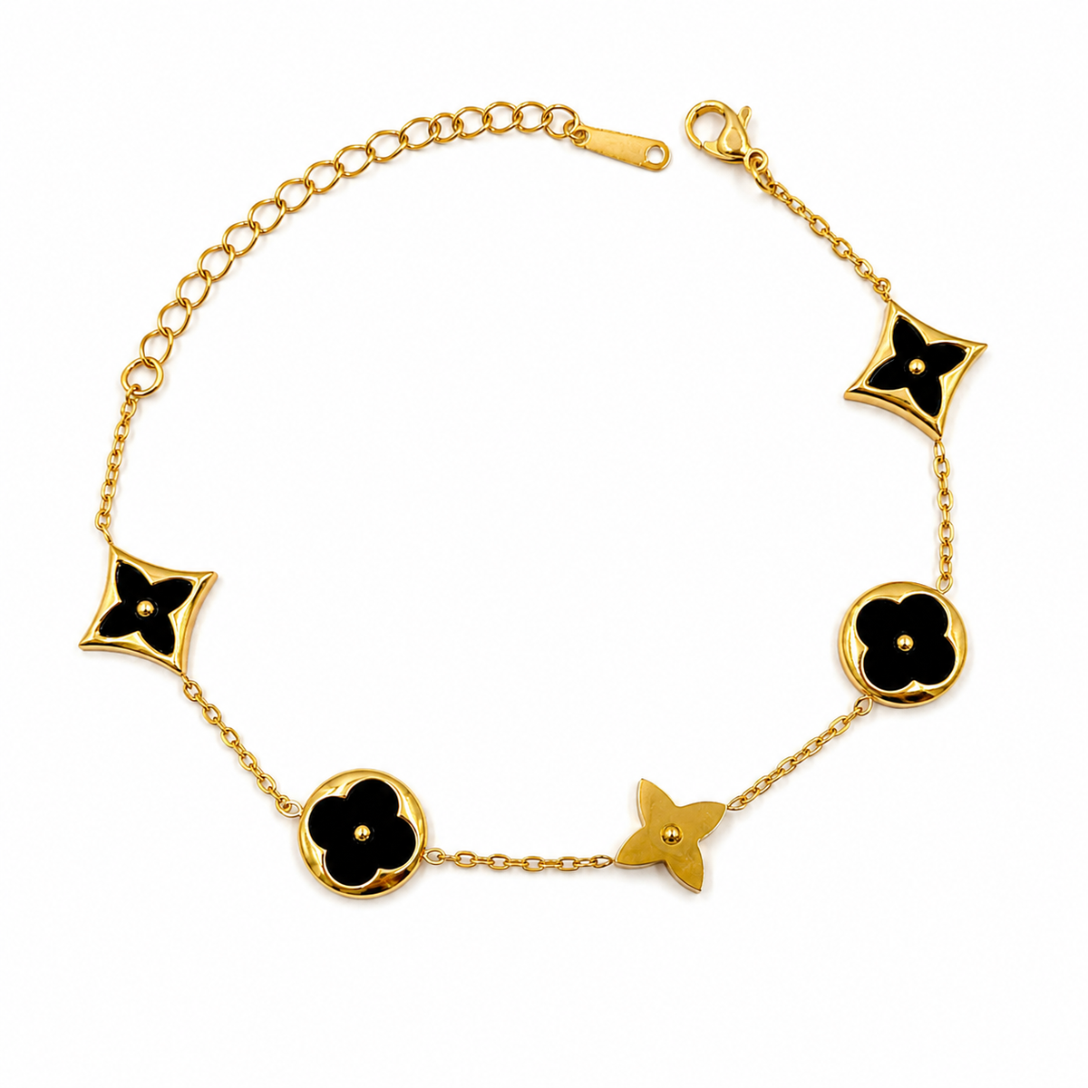 Pulsera con tréboles negro en Acero Dorado