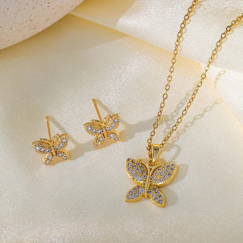 Cadena y dije con aros en acero dorado