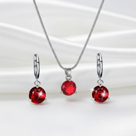 set de aros y colgante con piedra roja