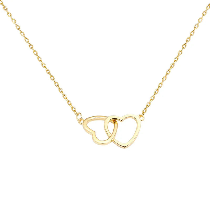 conjunto corazón doble en acero dorado