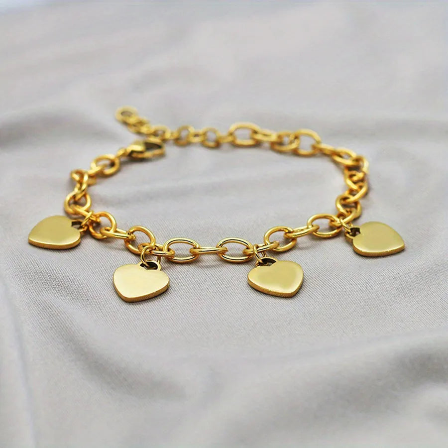 Pulsera de acero dorado con 4 corazones