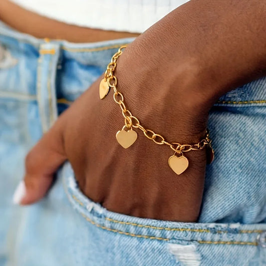 Pulsera de acero dorado con 4 corazones
