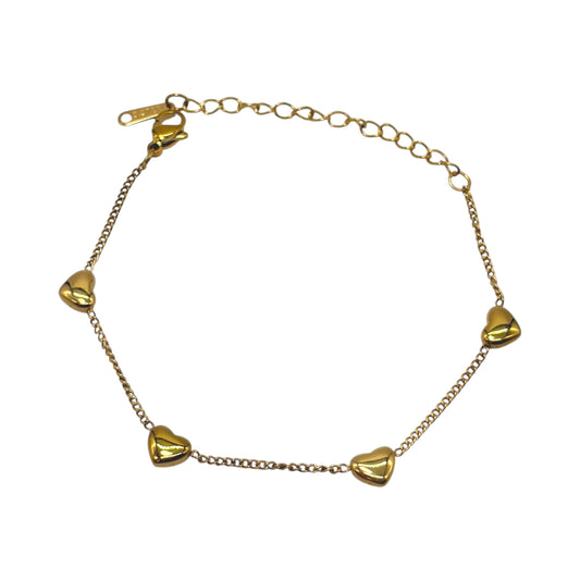 Pulsera de acero dorado con corazones inflados