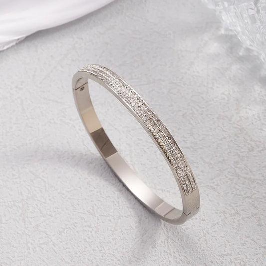 Pulsera rigida con strass en acero quirurgico