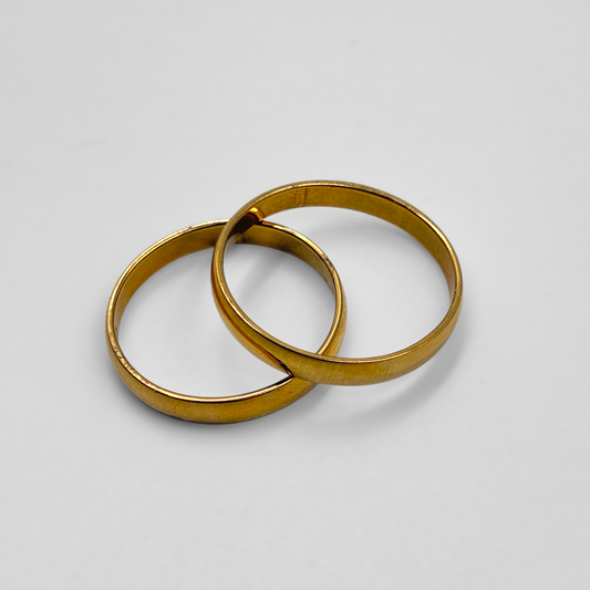 Par de alianzas de acero dorado 3mm