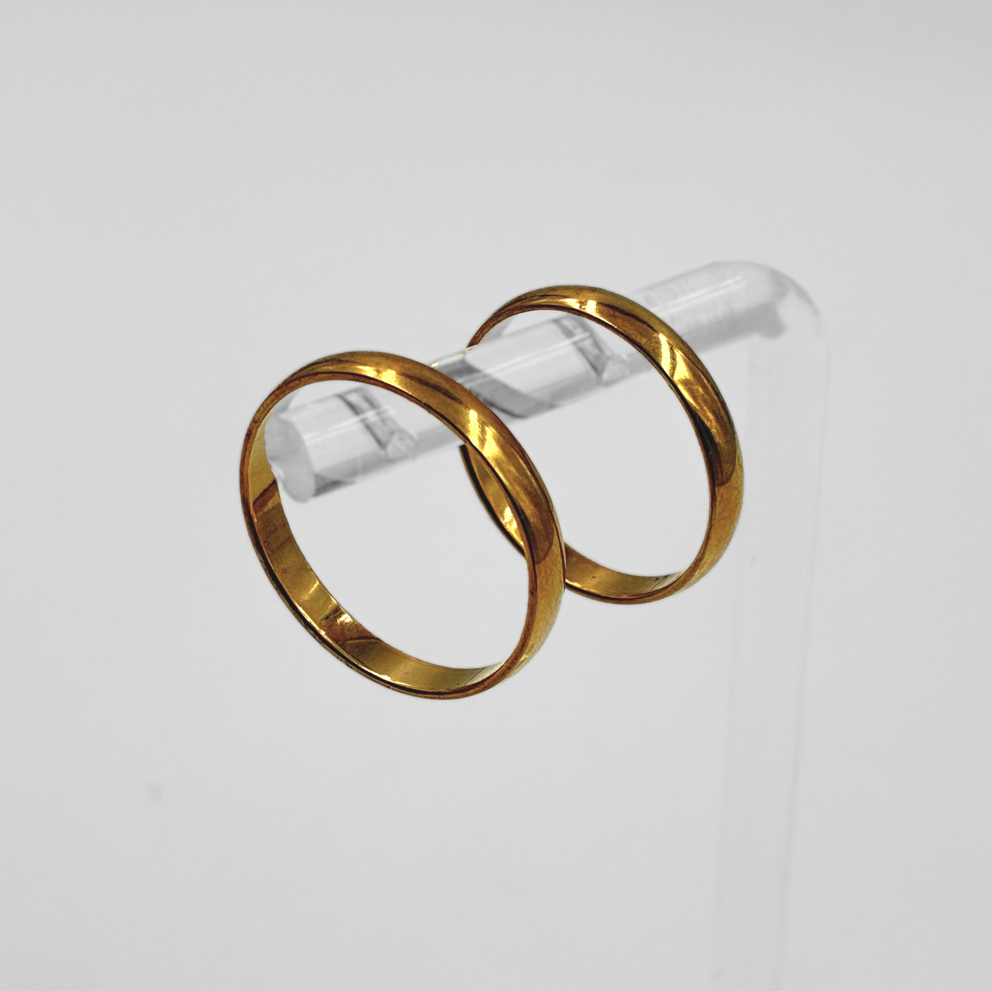 Par de alianzas de acero dorado 3mm