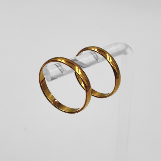 Par de alianzas de acero dorado 3mm